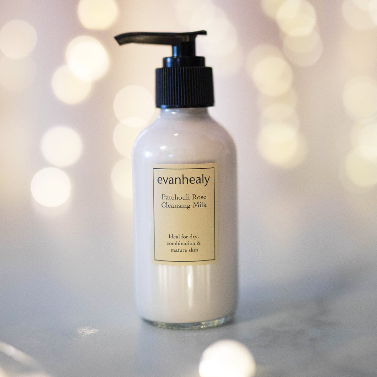 patchouli rose creamy facial cleansing milk face cleanser with twilight background