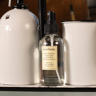 rose geranium hydrosol on bathroom sink