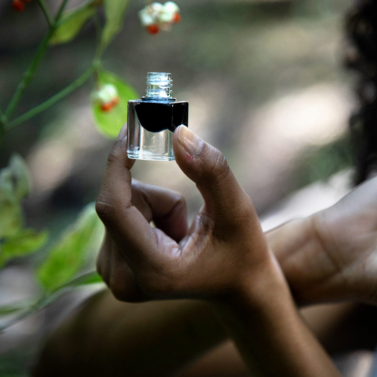 blue tansy essential oil perfume open in hand
