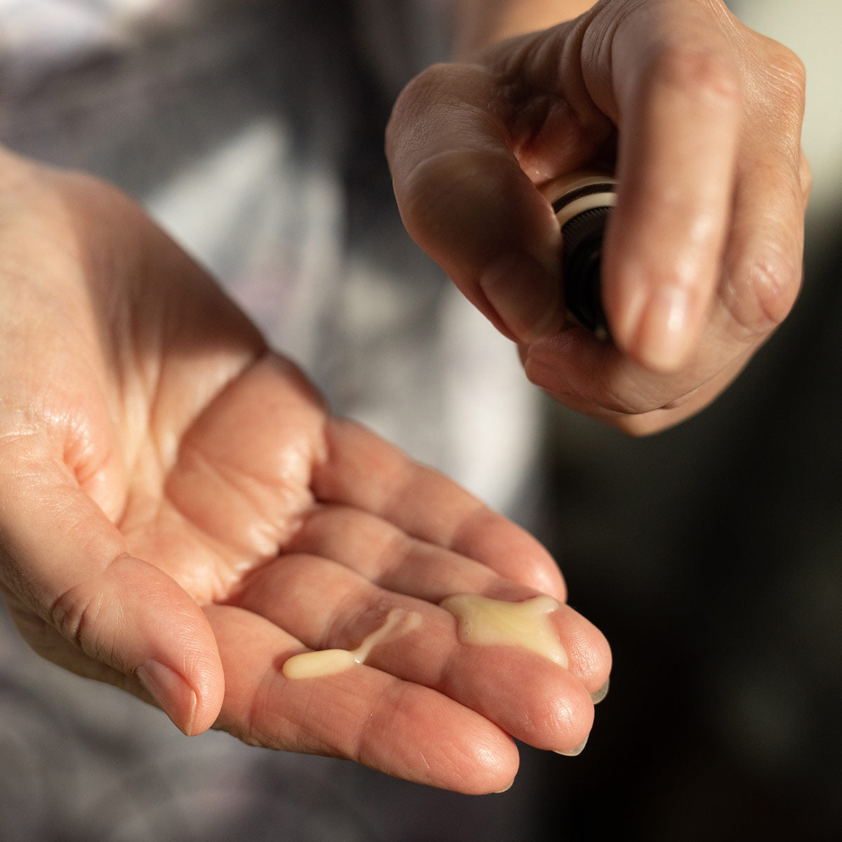 sea algae skin care product with serum texture in palm of hand