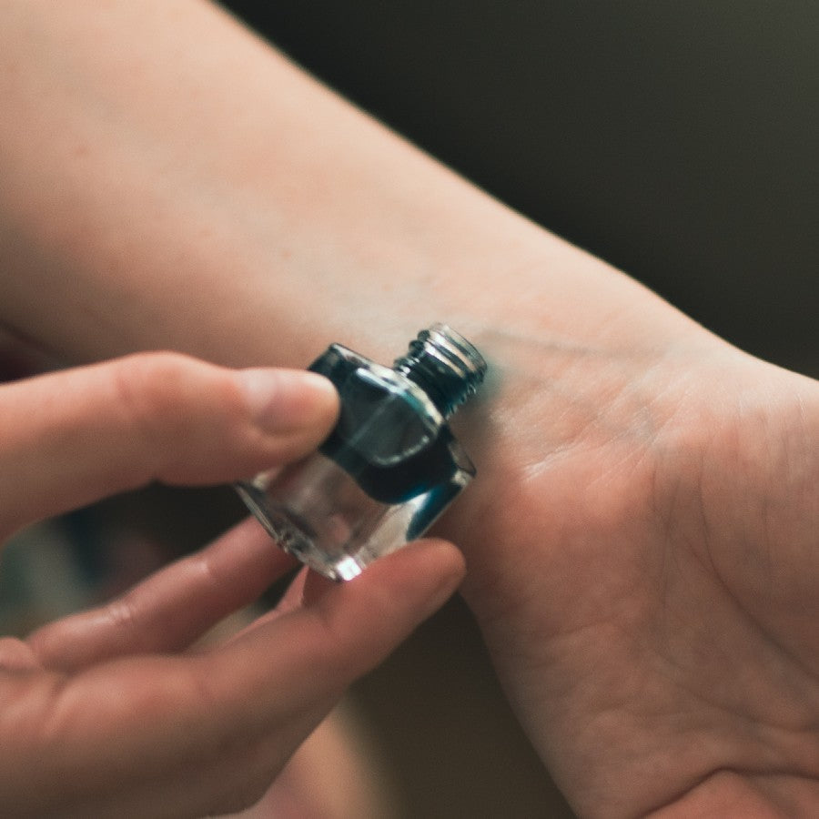 blue tansy essential oil perfume on poured on wrist