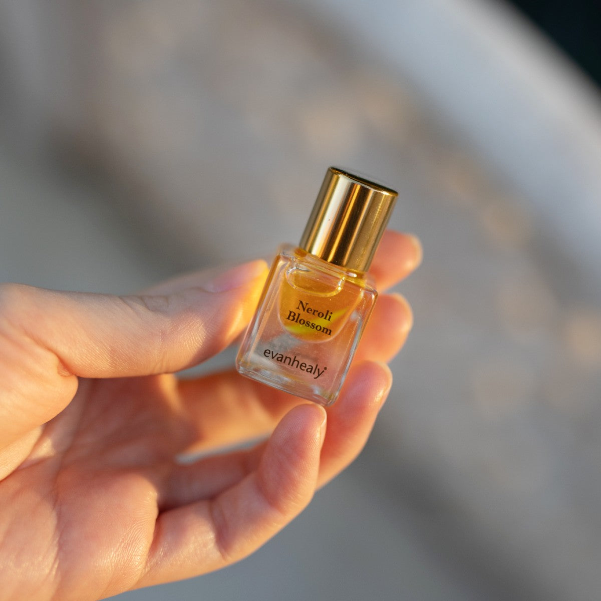 neroli blossom perfume outdoors in sunlight