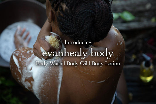 Person washing their back with foamy soap, overlaid text Introducing evanhealy body: Body Wash, Body Oil, Body Lotion