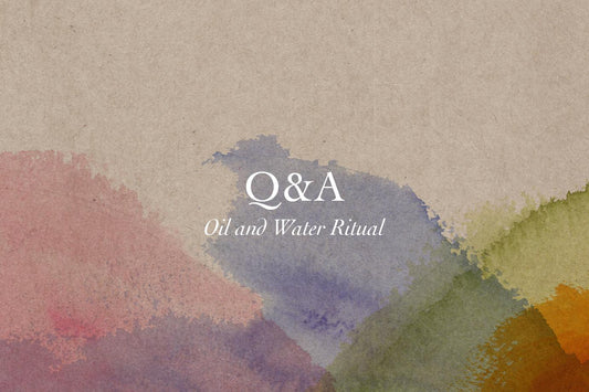 Blog header banner with watercolor washes and centered headline “Q&A: Oil and Water Ritual”