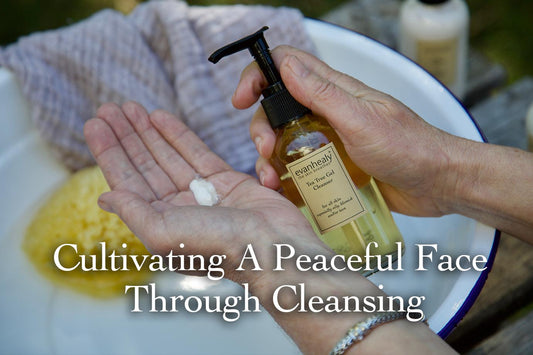 Hand dispensing evanhealy Tea Tree cleanser into palm over enamel bowl; headline Cultivating A Peaceful Face Through Cleansing