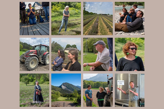 People touring lavender fields and farm equipment in rural France during an outdoor learning visit