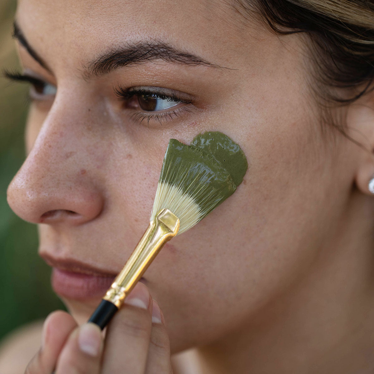 facial clay mask application with fan brush natural boars hair bristles