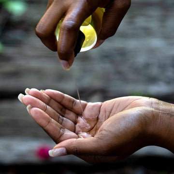 patchouli vanilla oil for body care texture in hand