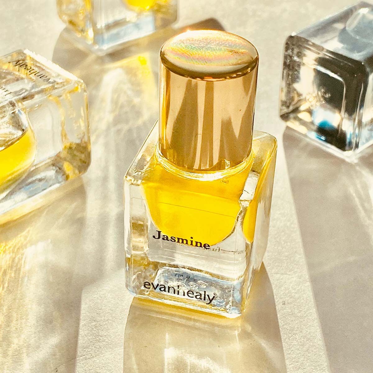 evanhealy jasmine perfume in glass jar with gold cap
