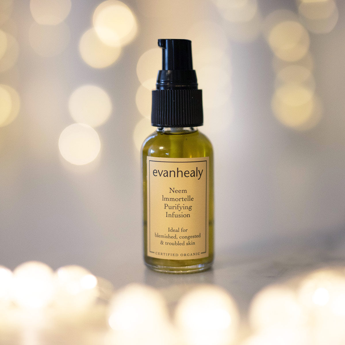 neem immortelle purifying infusion facial oil cleanser with twinkling lights