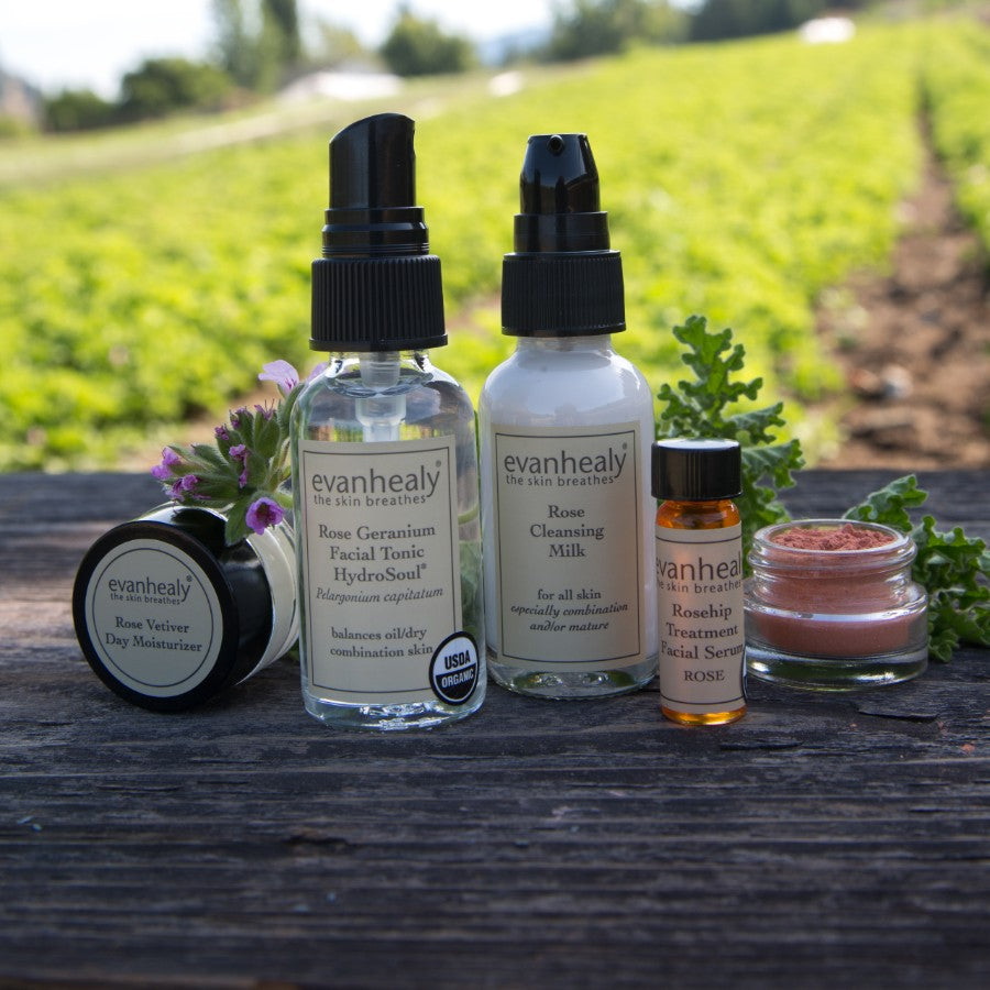 balancing skin care ritual products on outdoor wooden table